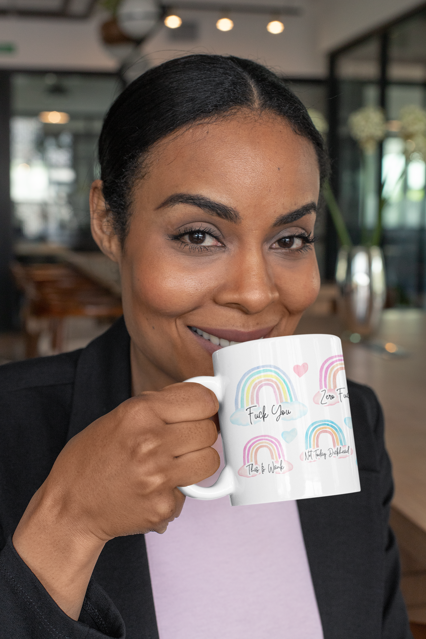 White mug featuring colourful watercolour rainbows. Over each one is a funny profanity quote such as 'no fucks club, not today dickhead & fuck off'.