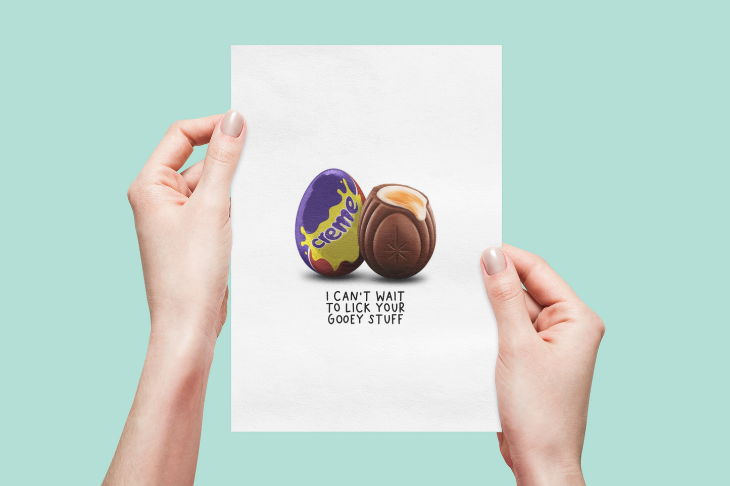A fun greetings card with an image of a creme egg to the front and a quote underneath them which reads 'i can't wait to lick you out' .