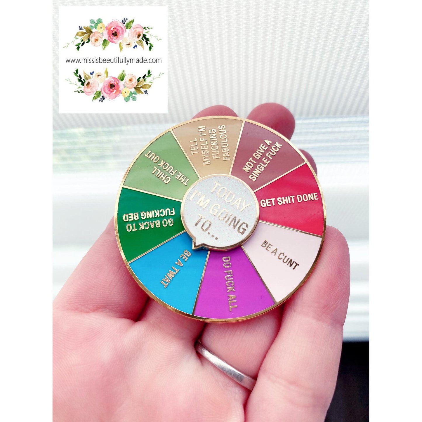 SPIN WHEEL PIN BADGE