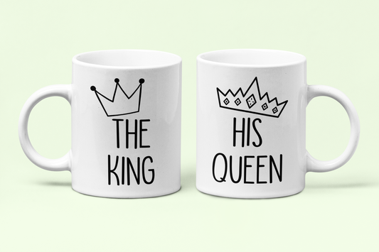 White mugs with the quotes the king & his queen with a cartoon crown printed to the top.