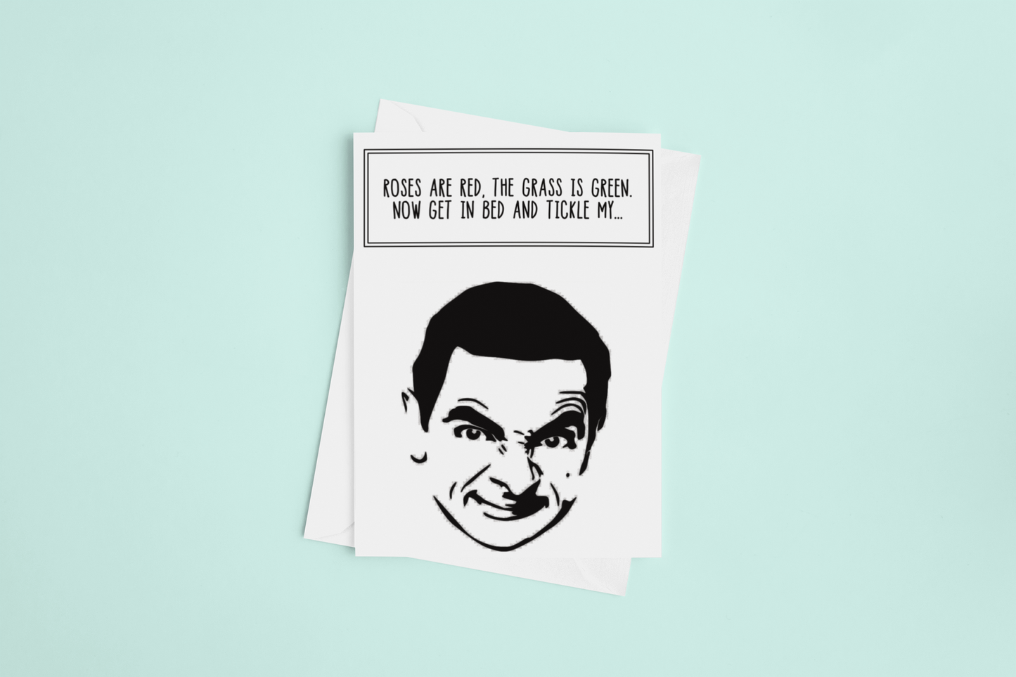 A white vertical greetings card featuring a silhouette of Mr Bean. To the top it reads 'roses are red, the grass is green, get in bed & tickle my...'. Printed in black ink.