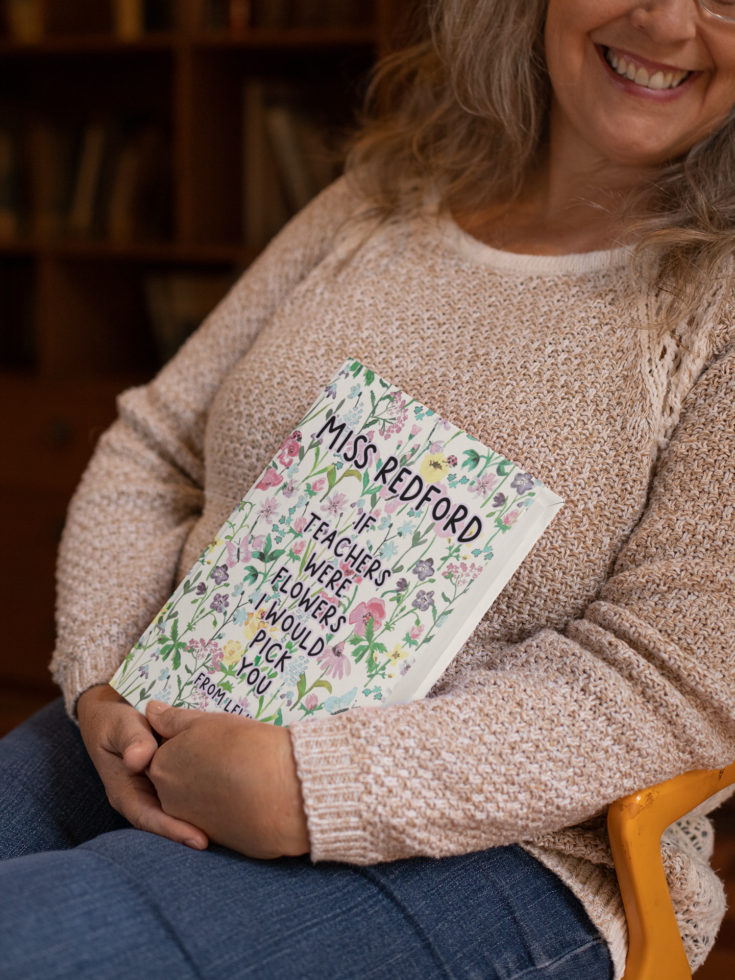 A floral notebook with the quote if teachers were flowers i'd pick you. It's also personalised with the child and teachers name.