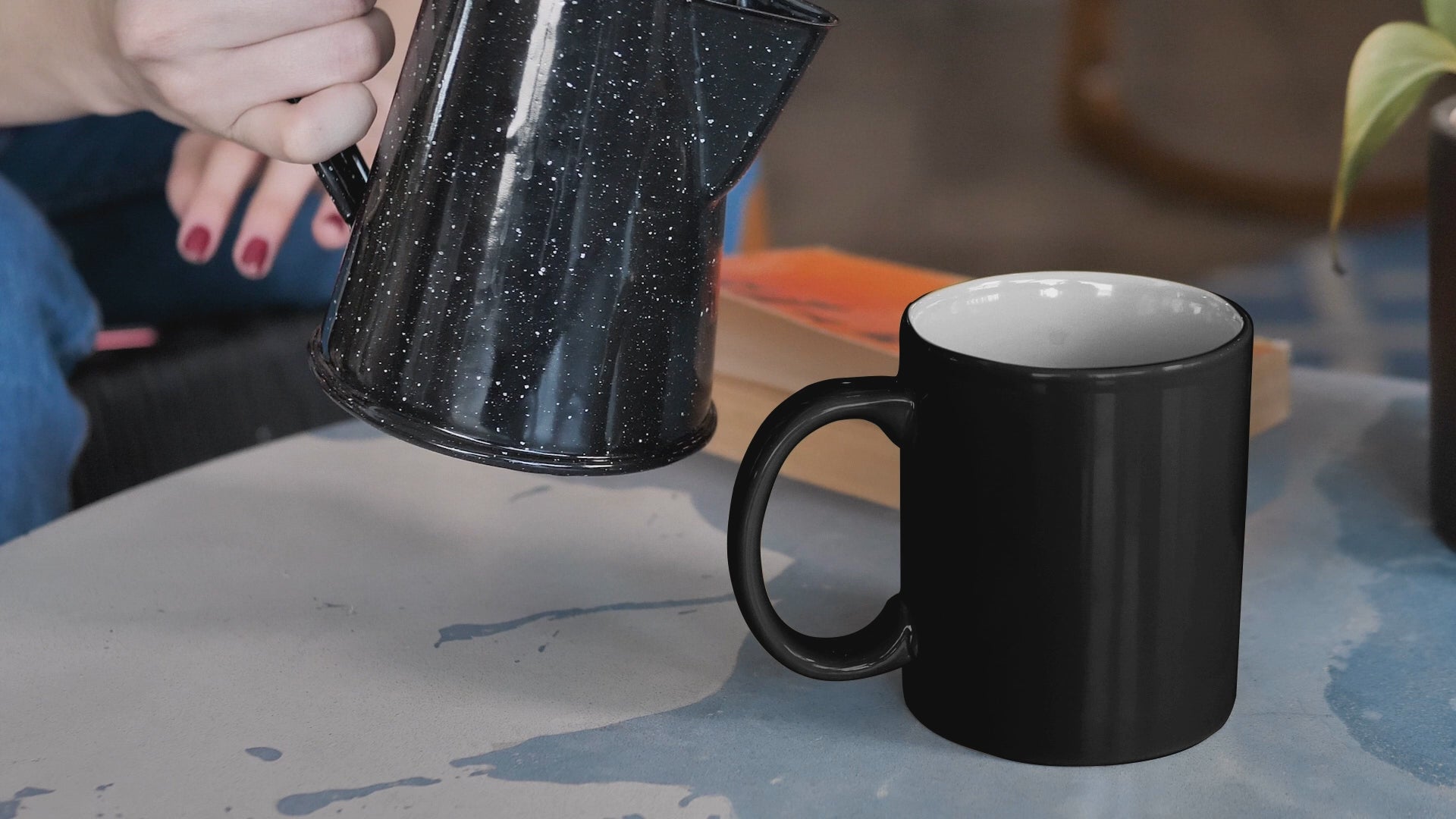 Video of a black colour changing mug with the quote did you know that dave spelt backwards is twatty mcthundercunt. Printed in black ink.