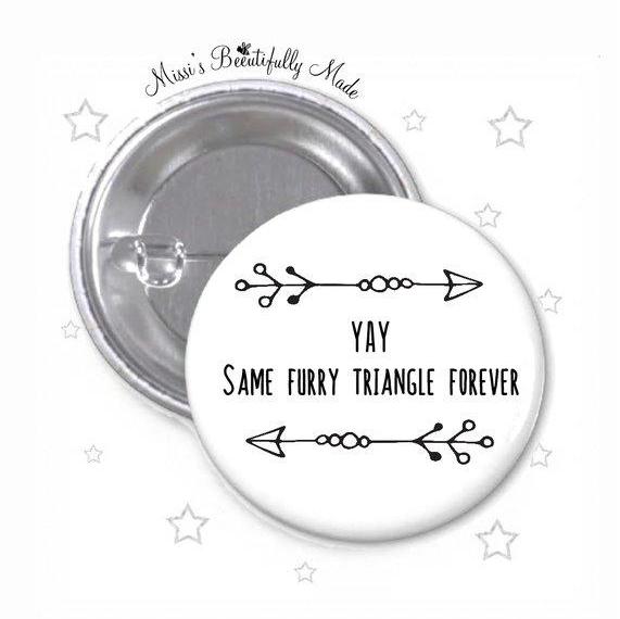 59mm round badge with the quote 'yay, same furry triangle forever'. 