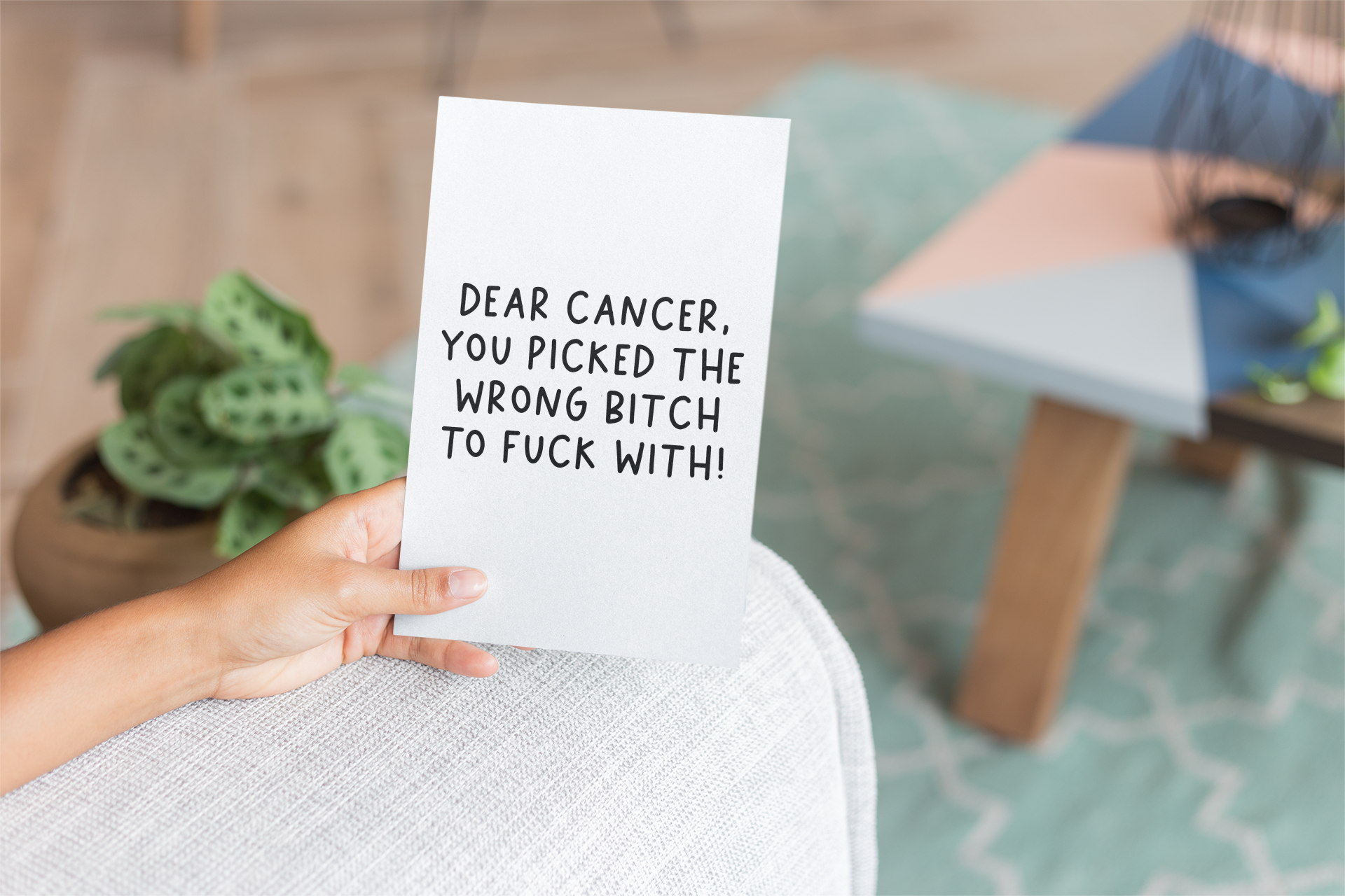 White vertical card featuring the quote 'dear cancer, you picked the wrong bitch to fuck with!' Situated in the middle in black ink.