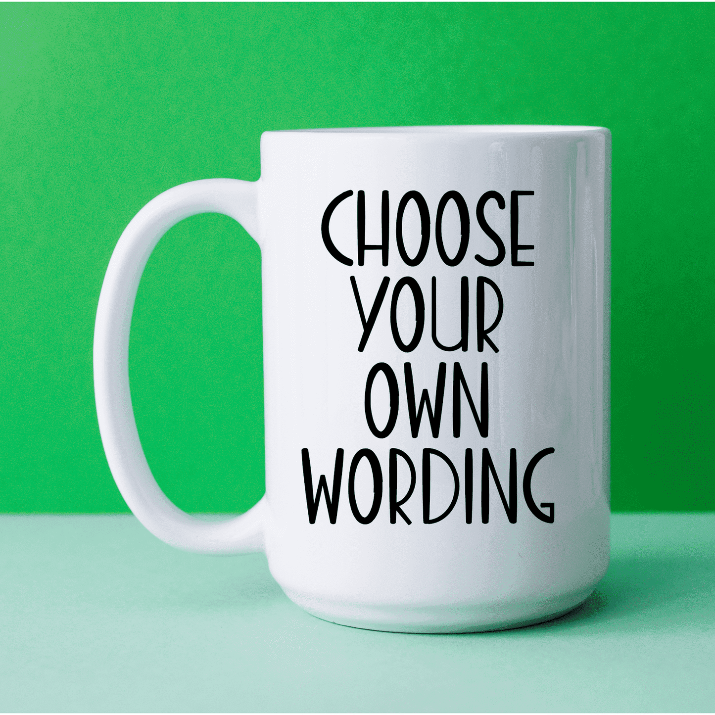 White mug with the words choose your own wording, printed in black ink.