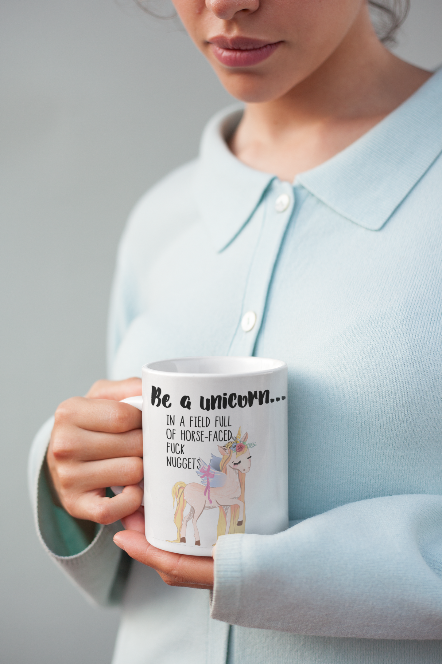 A white ceramic mug featuring a funny quote be a unicorn... In a field full of horsefaced, fucknuggets Printed in black ink with a cute pastel coloured unicorn underneath.A white ceramic mug featuring a funny quote be a unicorn... In a field full of horsefaced, fucknuggets Printed in black ink with a cute pastel coloured unicorn underneath.