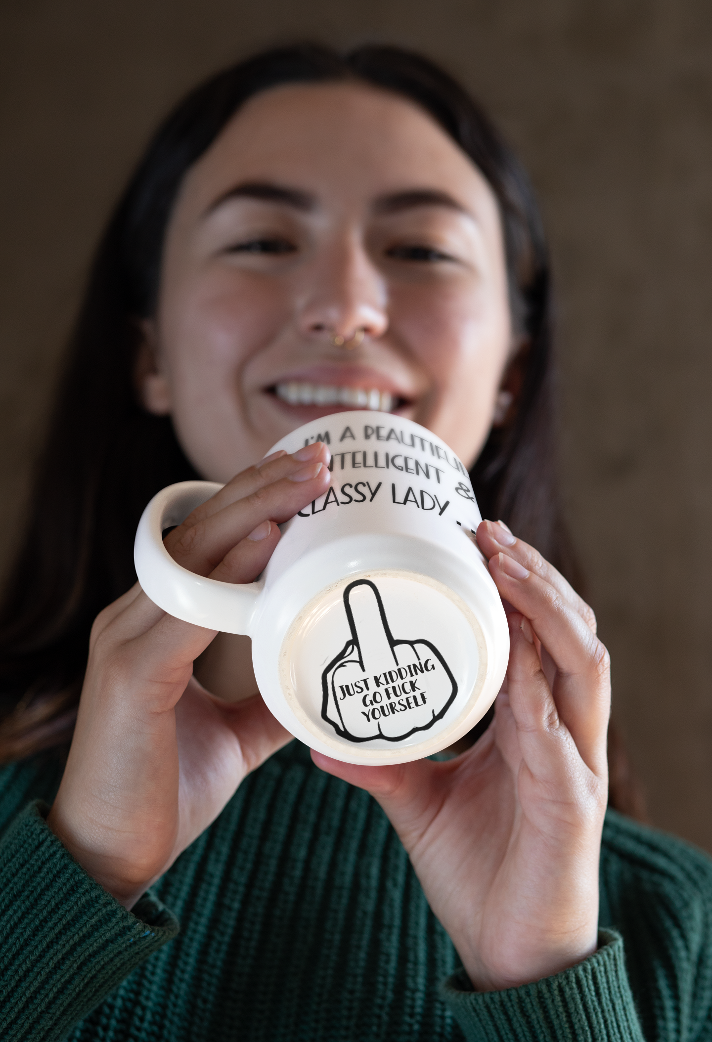White mug with the quote i'm a beautiful intelligent and classy lady to the front, on the bottom of the mug it has a middle finger decal with the words just kidding go fuck yourself.