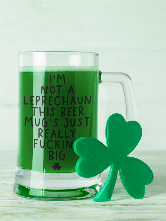 Large glass beer tankard with the funny quote 'i'm not a leprechaun, this beer mug's just really fucking big'.