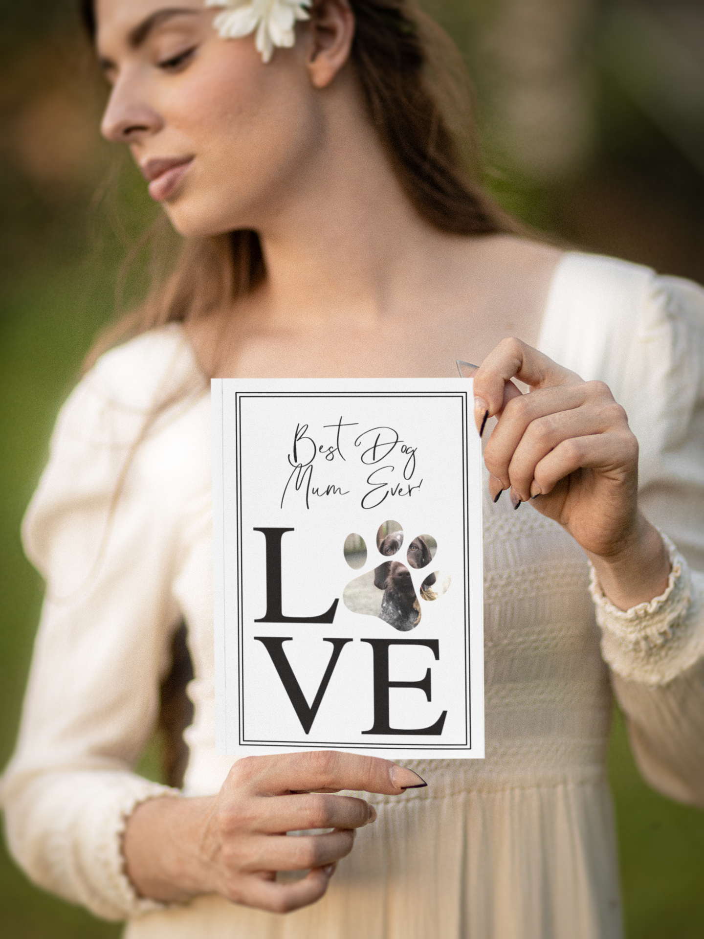 White greetings card personalised with a photo situated inside a paw print design. The wording reads 'best dog mum ever..