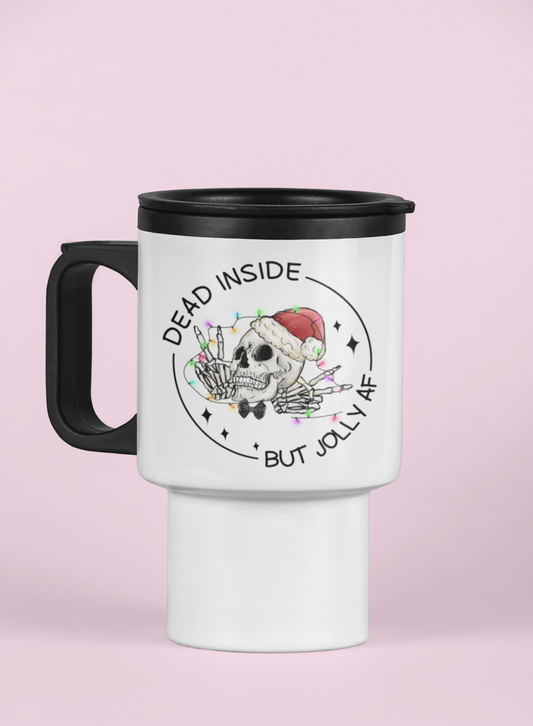 White travel mug with a black handle & black lid featuring a fun christmas skull design with the words dead inside but jolly as fuck. Printed in black ink.