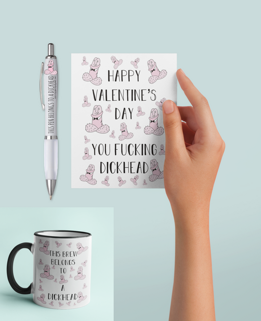 Valentine's bundle pack featuring a greetings card, mug and a pen with a fun penis drawing throughout & All containing the hilarious quote 'happy valentine's day you fucking dickhead'. The pens says 'this pen belongs to a dickhead'.