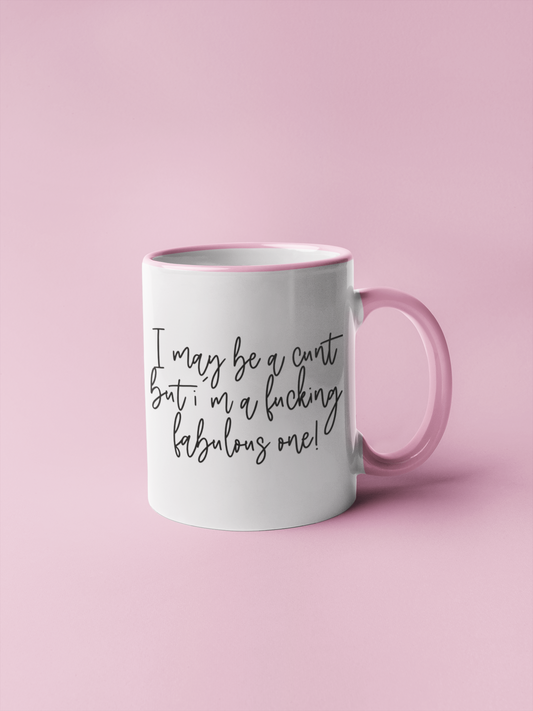 A white ceramic mug featuring the funny quote I may be a cunt, but i'm a fucking fabulous one. Printed in black ink.