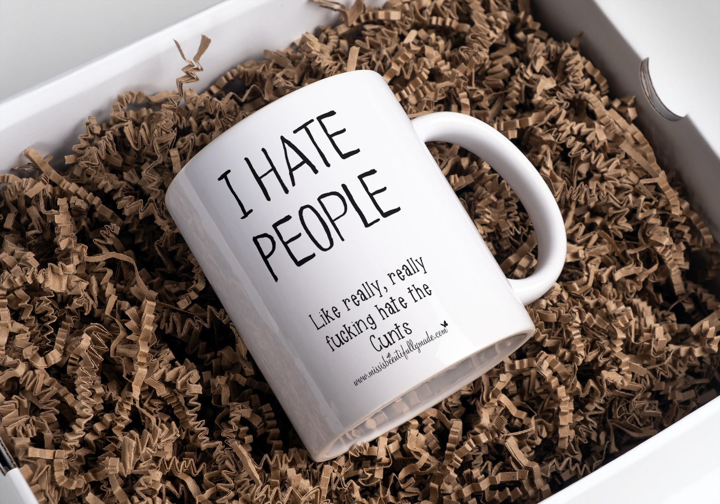 Very funny white ceramic mug with a profanity quote printed to the front I hate people, like really really fucking hate the cunts. The text is printed in black ink.