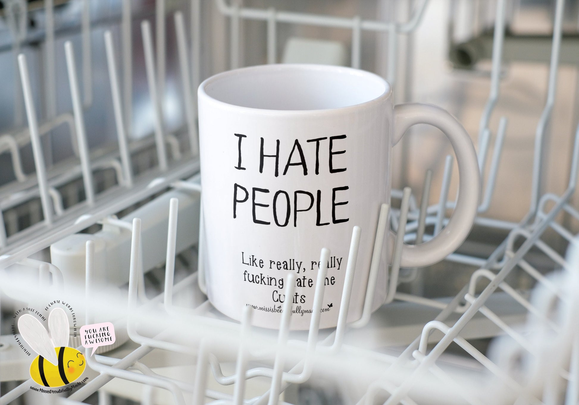 Very funny white ceramic mug with a profanity quote printed to the front I hate people, like really really fucking hate the cunts. The text is printed in black ink.