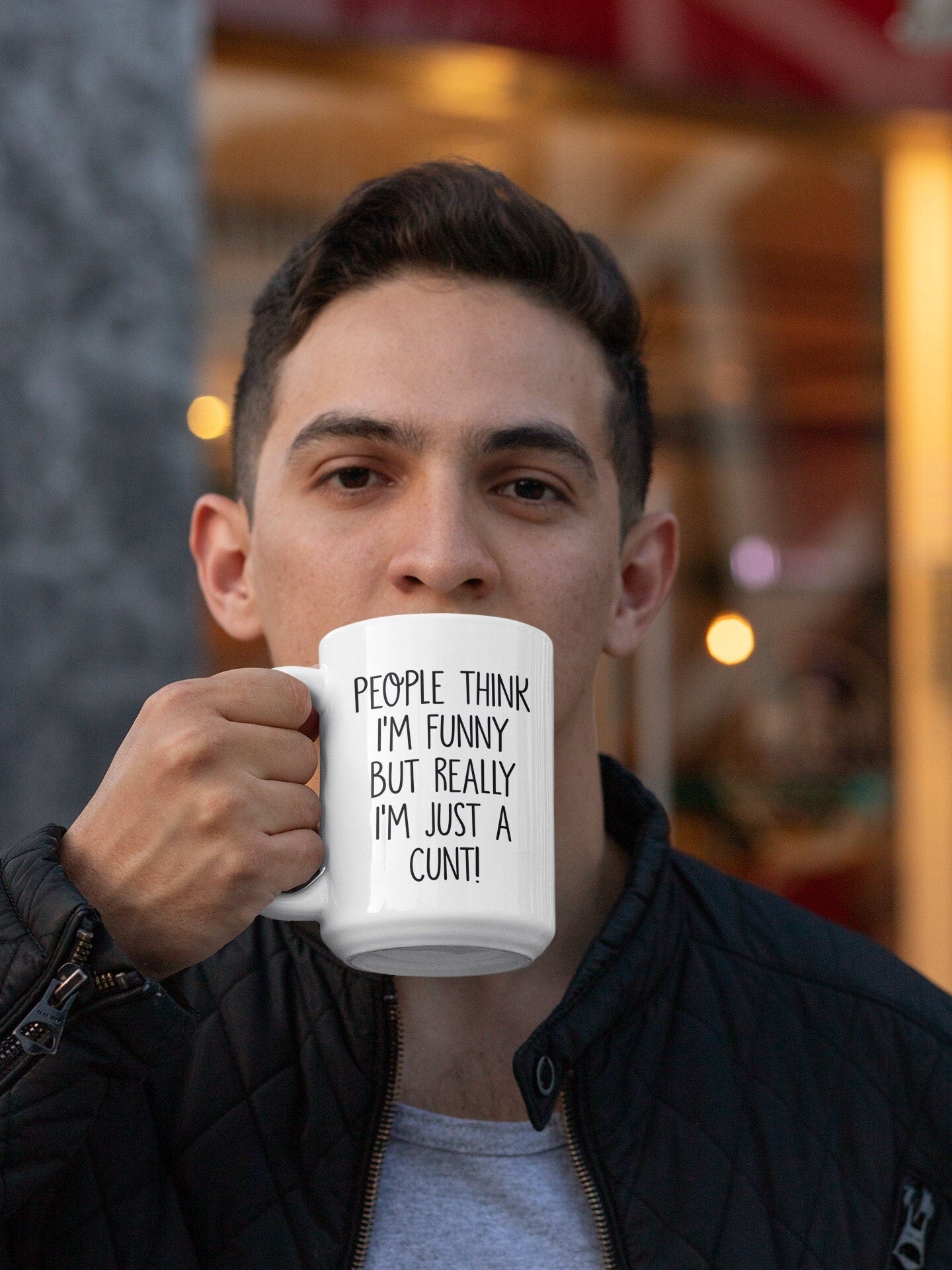 A white ceramic mug featuring the funny quote people think i'm funny but really i'm just a c*nt. Printed in black ink.