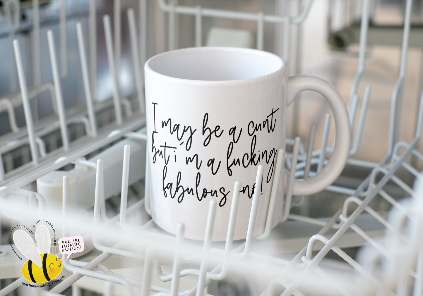 A white ceramic mug featuring the funny quote I may be a cunt, but i'm a fucking fabulous one. Printed in black ink.