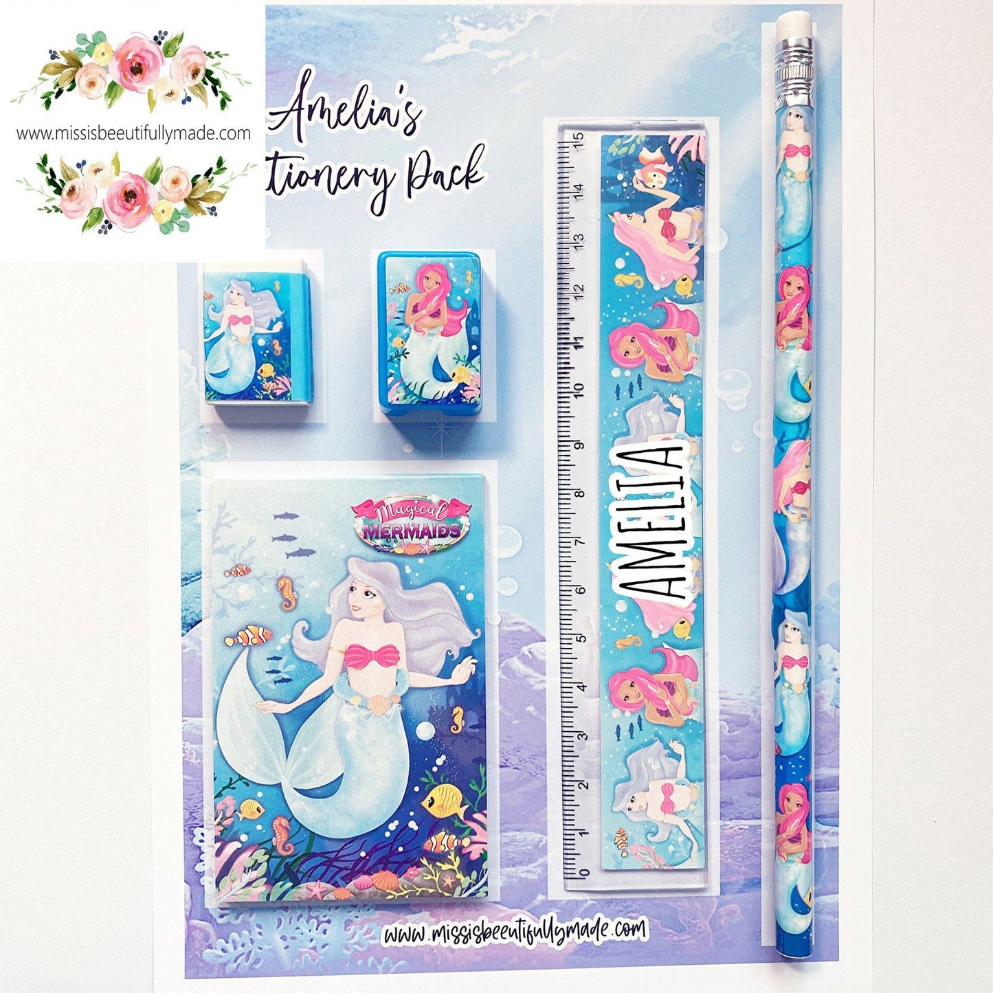 Personalised Children's stationery set in a mermaid, under the sea design. The contents are, rubber, sharpener, notepad, ruler & pencil. All complete on a personalised backing card. The ruler is also personalised with Childs name.