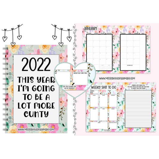 Digital notebook planner in a floral design with the quote this year I'm going to be a lot more cunty. A yearly planner with sections for notes, weekly planning and monthly planning. Funny affirmations throughout. Instant download