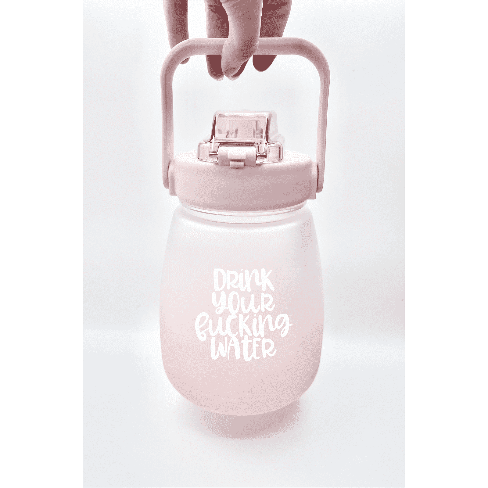 1.5 later water bottle with a handle in a choice of pink or purple. You can sip from the spout or use a straw. It has white vinyl details which says drink your fucking water own one side and the other side has a helpful timely tracker
