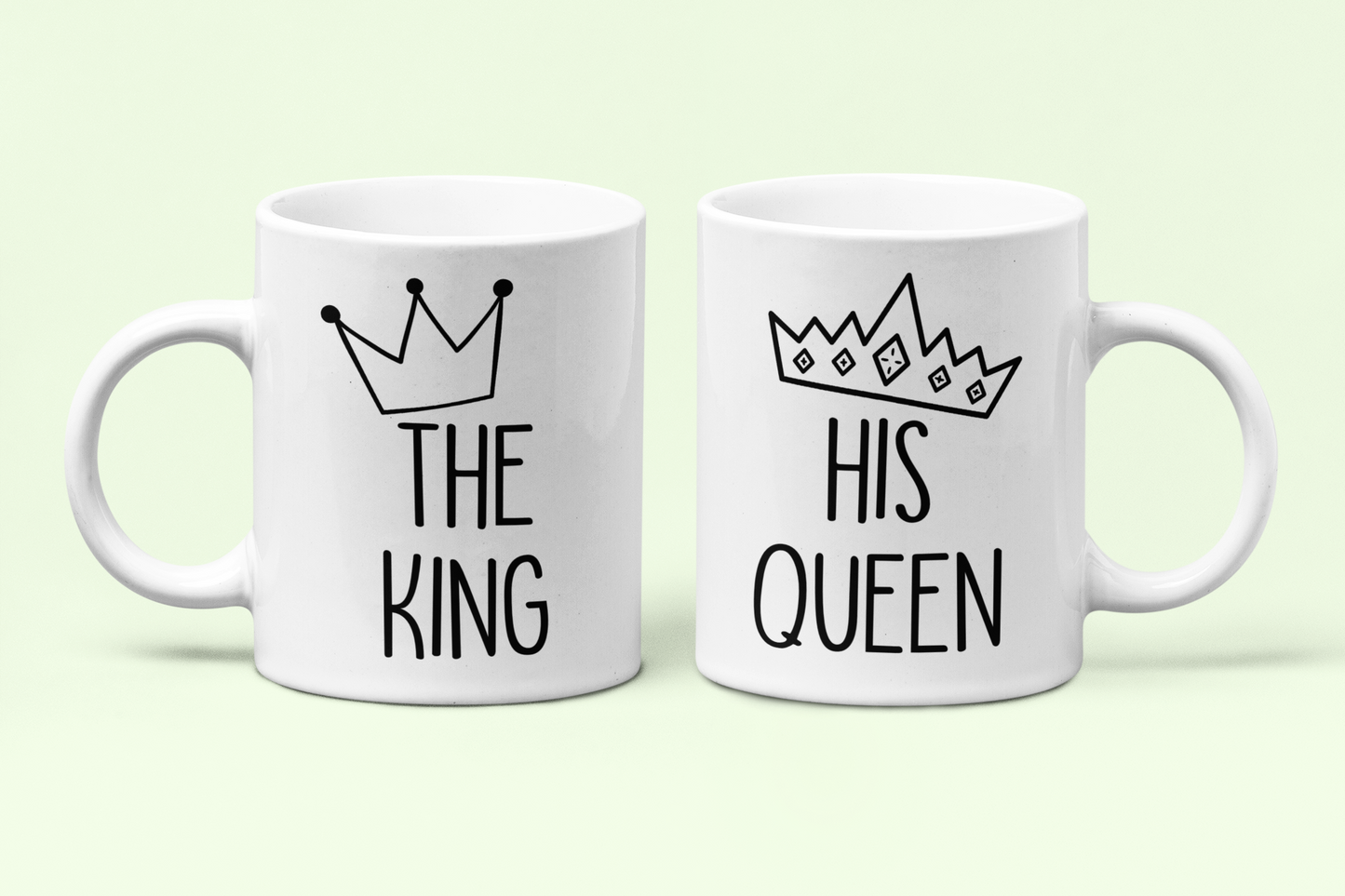 White mugs with the quotes the king & his queen with a cartoon crown printed to the top.