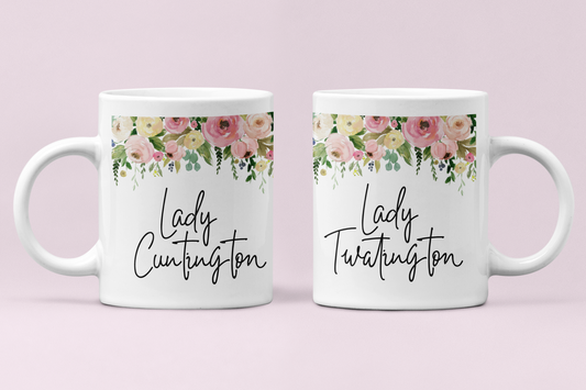 Two white mugs with a colourful floral border to the top. Underneath is the quote lady cuntington on one and lady twatington on the other.