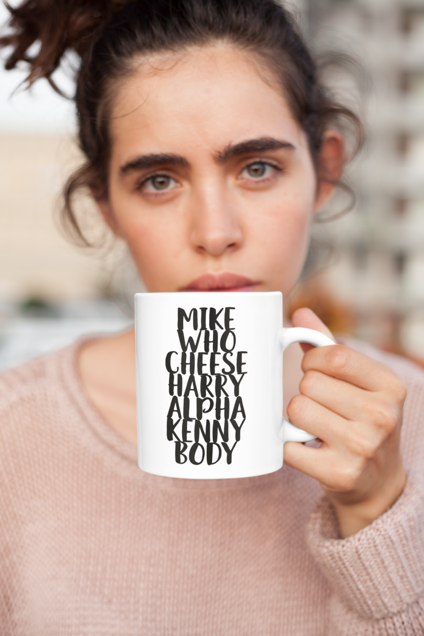 White mug with the quote mike who cheese alpha kenny body printed down the middle in black ink.