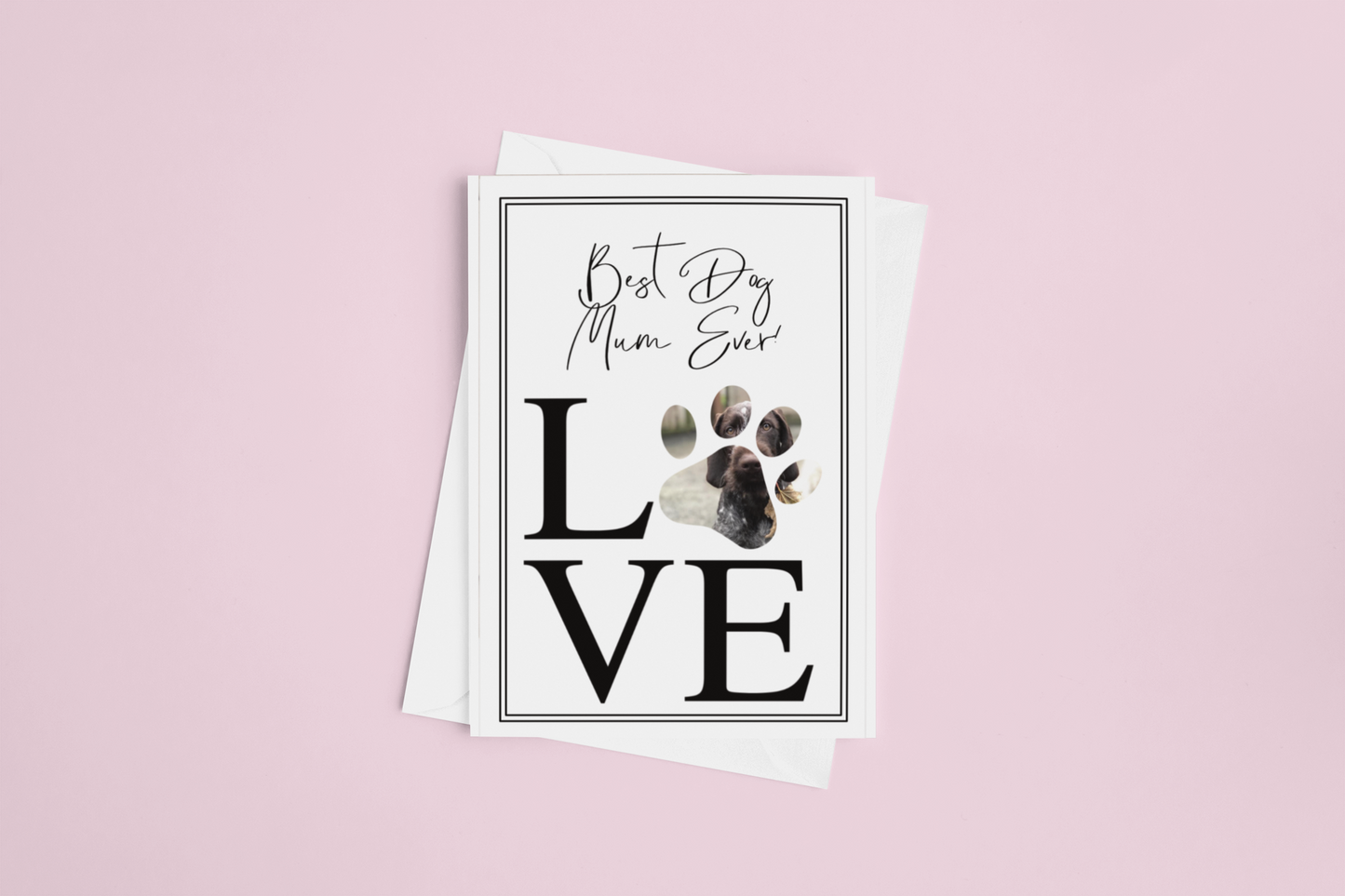 White greetings card personalised with a photo situated inside a paw print design. The wording reads 'best dog mum ever..