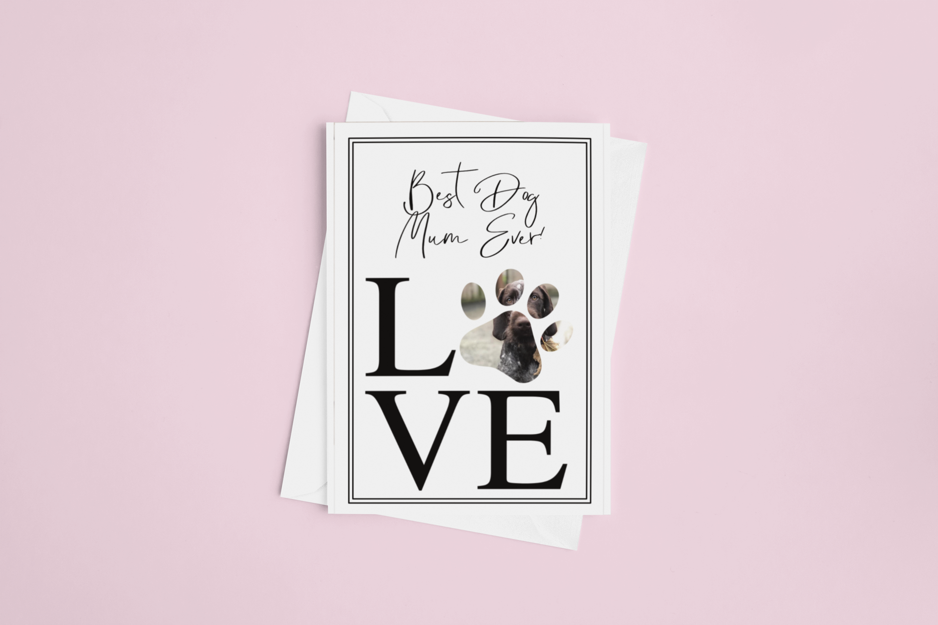 White greetings card personalised with a photo situated inside a paw print design. The wording reads 'best dog mum ever..