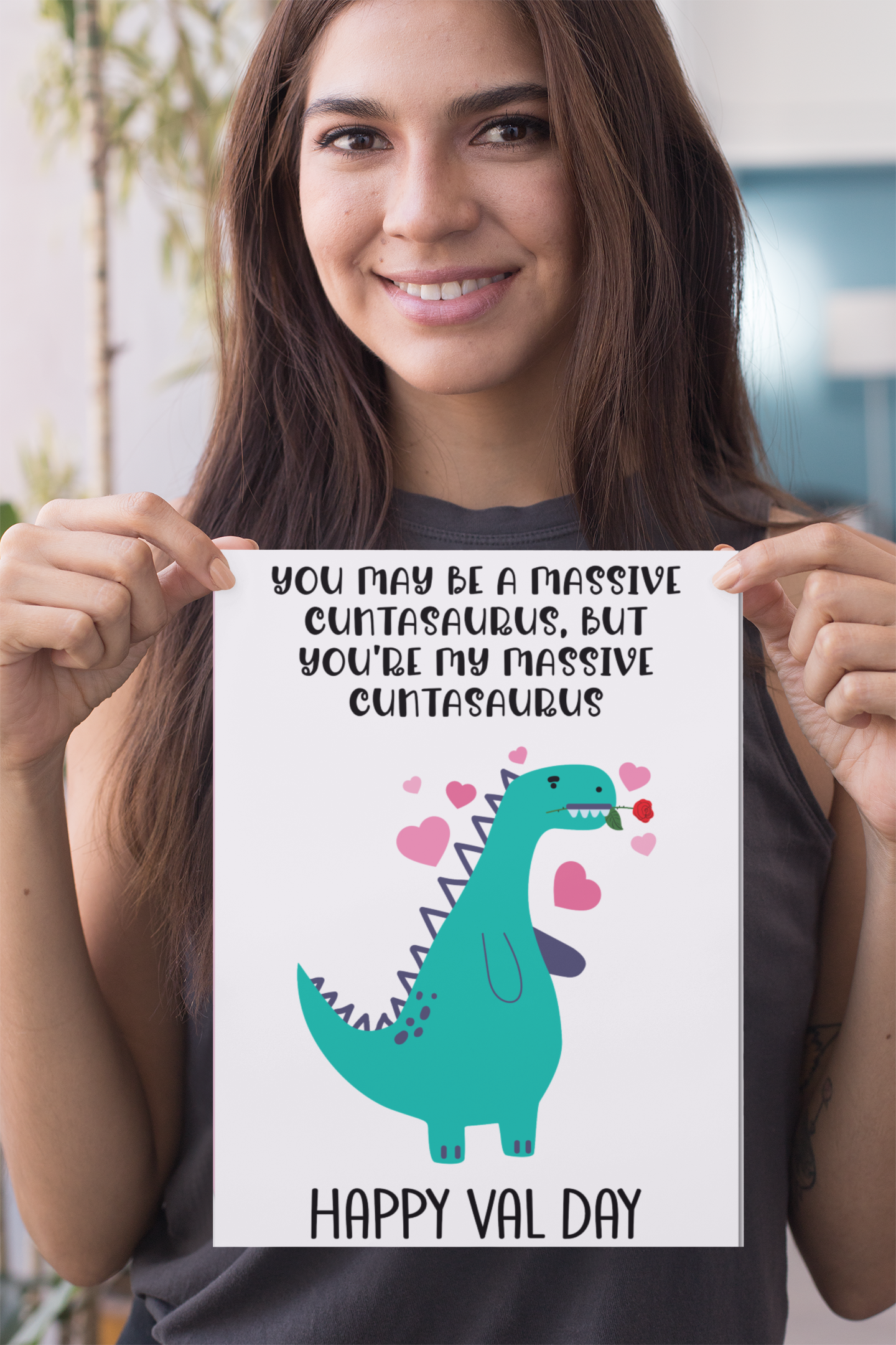 A5 glossy white card with a valentines dinosaur design to the front. The quote reads 'you may be a massive cuntasaurus, but you're my massive cuntasaurus'. With happy val day situated at the bottom. The inside is left blank.