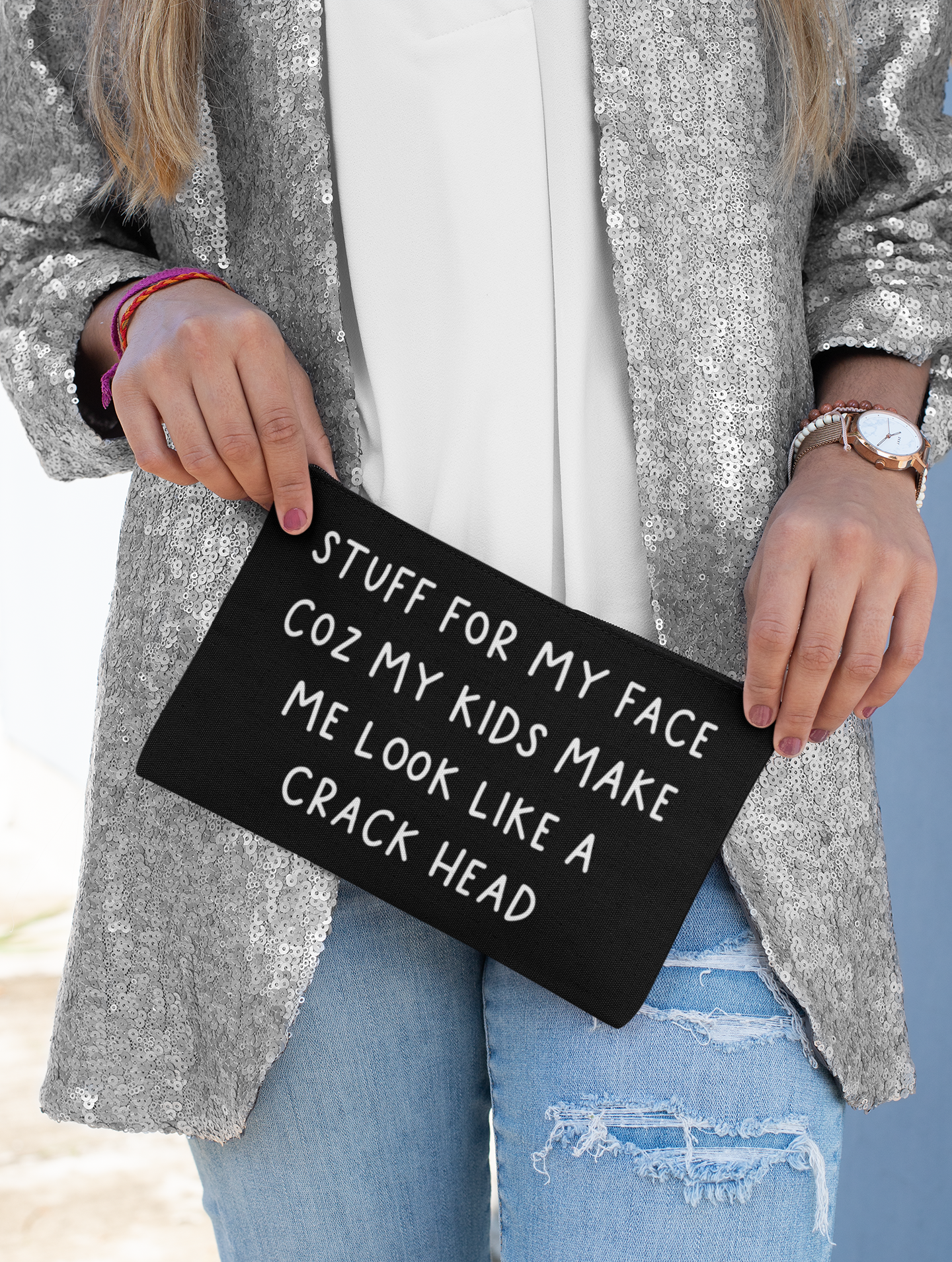 Black canvas make up bag with white lettering to the front featuring the funny quote 'stuff for my face coz my kids make me look like a crack head'. 