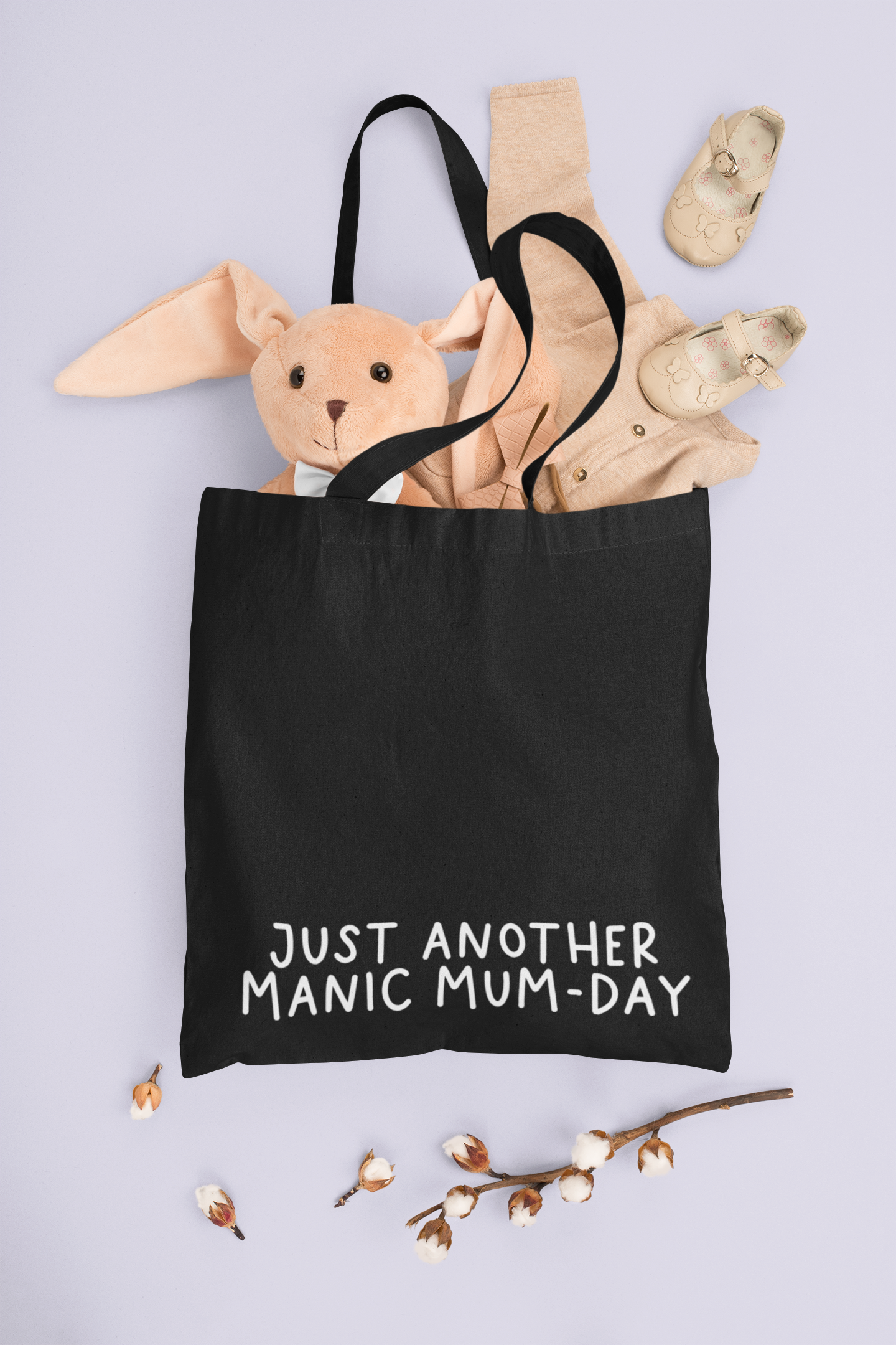 Black cotton tote bag with a quote to the bottom whoch reads 'just another manic mum-day' in white lettering.