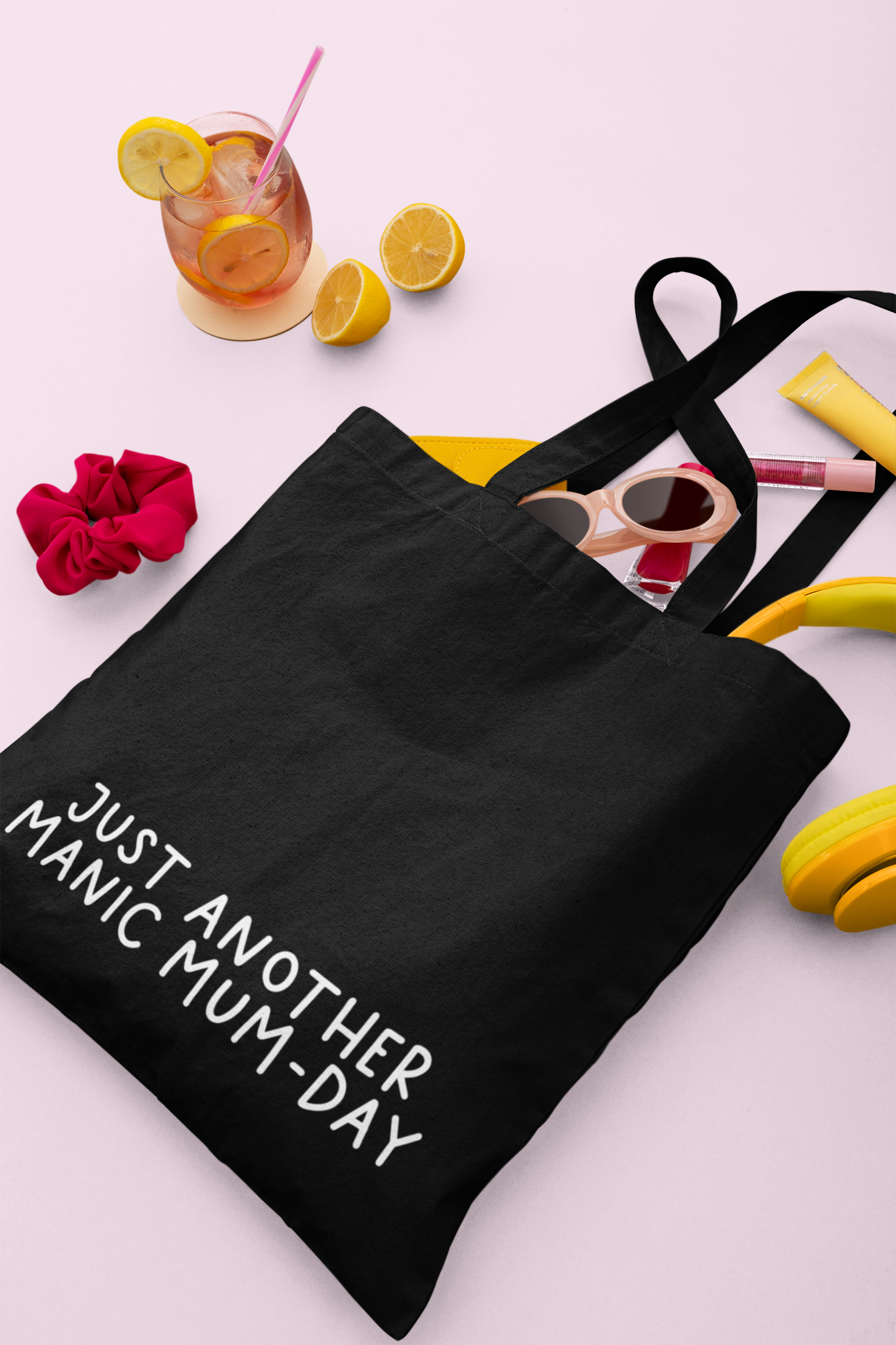 Black cotton tote bag with a quote to the bottom whoch reads 'just another manic mum-day' in white lettering.