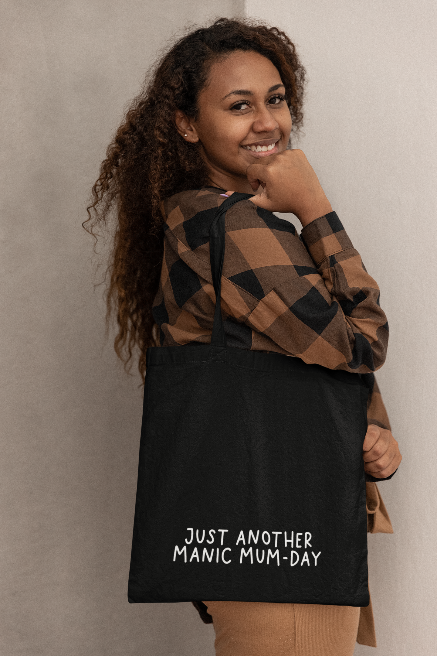 Black cotton tote bag with a quote to the bottom whoch reads 'just another manic mum-day' in white lettering.