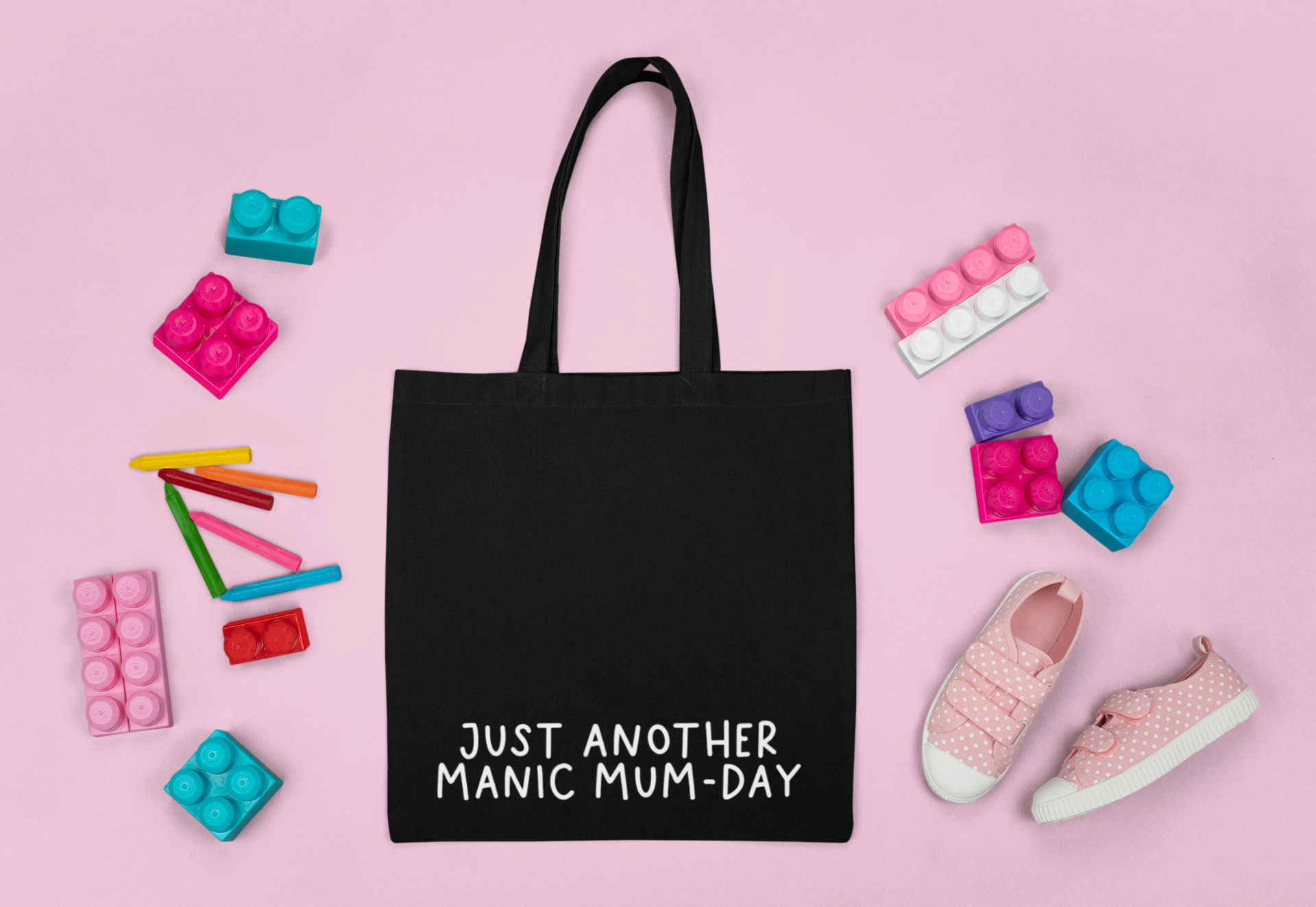 Black cotton tote bag with a quote to the bottom whoch reads 'just another manic mum-day' in white lettering.