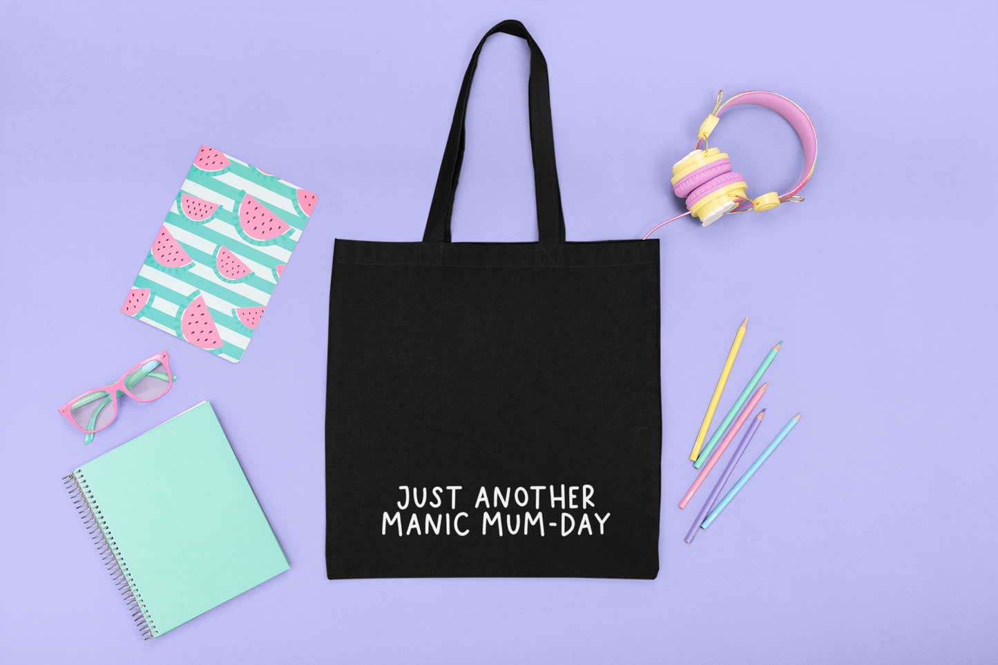 Black cotton tote bag with a quote to the bottom whoch reads 'just another manic mum-day' in white lettering.