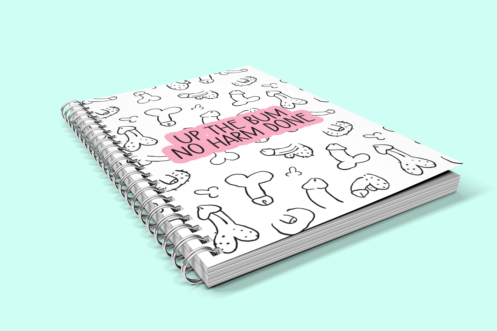 A white A5 notebook featuring a fun willy design print to the front. Over the print is a funny quote 'up the bum, no harm done', printed in black & pink ink. The notebook is binded together with a metal coil & contains 75 pages.