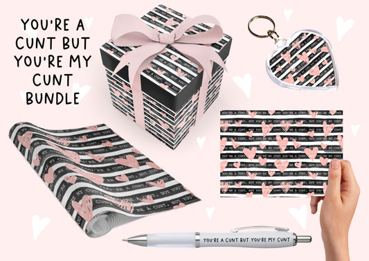 A Valentine's bundle featuring gift wrap sheet, greetings card, pen & a heart keyring all with a matching design of black stripes with pink hearts & the funny quote 'you're a c*nt but you're my c*nt'.